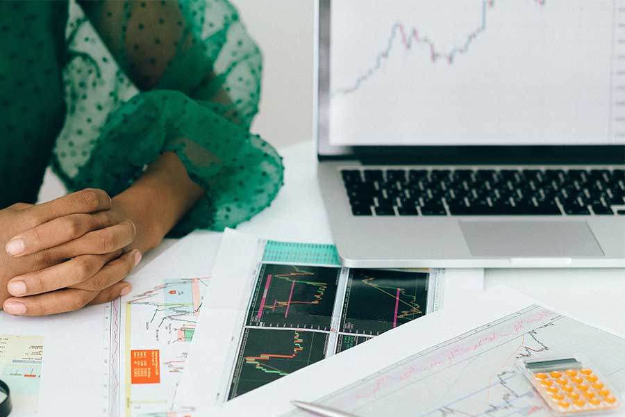 women analyzing her SEO rankings after a redesign